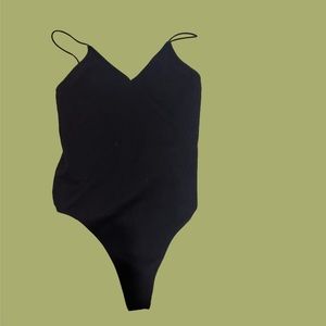 black ribbed body suit